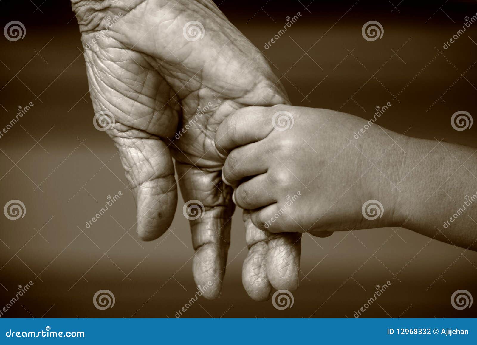 hands old holding and young